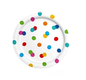 Close-up of a white paper plate with colorful polka dots for birthday party tableware