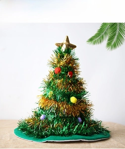 Glow-in-the-dark Christmas tree hat with gold tinsel and colorful pom pom decorations