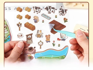 Detail of 3D PET farm stickers with thick white ink process being peeled by tweezers