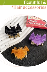 Glittery bat hair claws in black purple and orange for Halloween hair styling