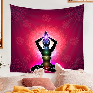 Detail of meditation tapestry with 7 chakra points and mandala on a purple wall