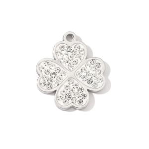 Macro detail of silver clover pendant with heart leaves and inlaid cubic zirconia