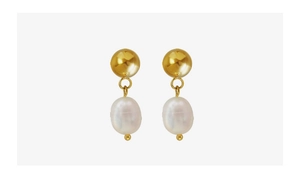 Close-up of gold stud earrings with baroque white pearls showing detailed texture