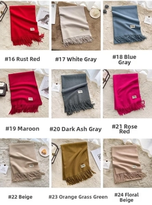 Collage of multi-color cashmere feel knitted scarves with long tassels in nine stylish shades