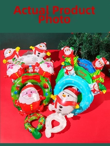Detailed view of Christmas balloons featuring Santa and snowman in aluminum foil