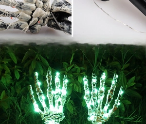 Adjustable skeleton hand garden stakes with green LED lights for Halloween decor