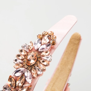Vintage pink satin headband with sparkling champagne crystals in a floral cluster design