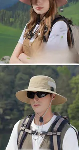 Detail view of beige sun hat featuring a wide 8cm brim and breathable mesh vents
