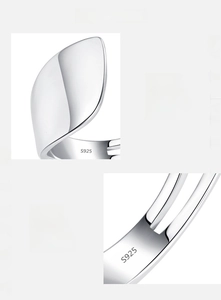 Macro detail of S925 sterling silver ring showing polished finish and hallmark engraving