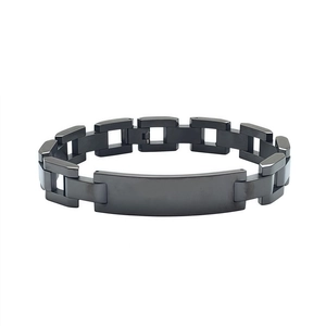 Detail of matte black stainless steel link bracelet with a blank rectangular metal plate