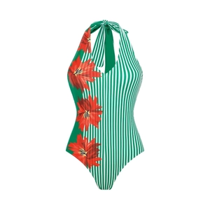 Detail of red tropical floral print on green striped halter neck one-piece swimsuit
