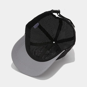 Detail view of breathable mesh lining and inner label of a polyester sports baseball cap