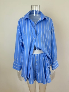 Detail of blue and white striped long sleeve shirt and matching elastic waist shorts