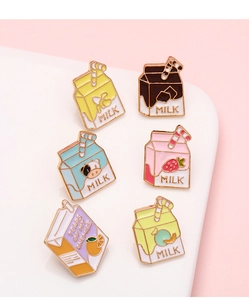 Detailed view of six colorful enamel milk carton pins with gold metal outlines