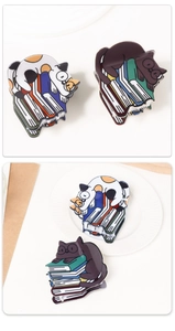 Détails de pinces à cheveux chat et livre en acrylique, couleurs blanc et café glacé