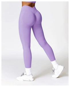 Detail view of purple high waist yoga leggings with scrunch butt lifting effect