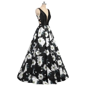 Elegant sleeveless V-neck evening gown featuring a black bodice and floral print A-line skirt