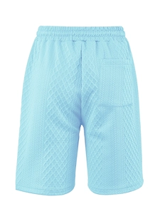 Detail of blue men's casual shorts showing waffle knit texture and back pocket design