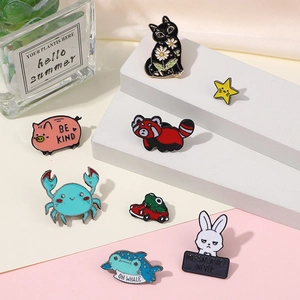 Detailed arrangement of cute cartoon enamel badges with animals and creative slogans