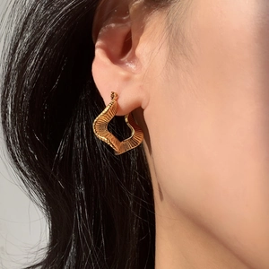 18K gold plated stainless steel hoop earrings with retro geometric wave texture