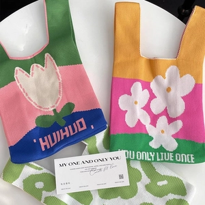 Chic knit tote bags with floral patterns like tulips and daisies in vivid colors