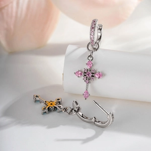 Silver zircon huggie earrings with colorful cross pendants and crystal accents
