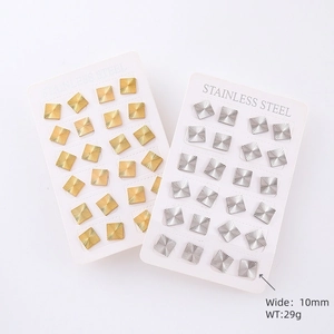 Detailed view of 10mm gold and silver square stainless steel earrings with radial patterns