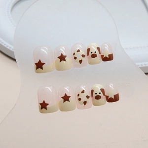 Faux ongles amovibles chiot mignon jaune crème et marron avec motifs d'étoiles