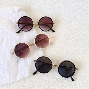 Fashionable round frame kids sunglasses in vintage gold metal with gradient lenses