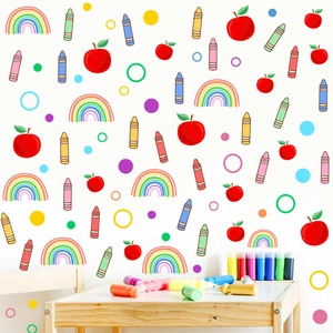 Rainbow and crayon PVC wall stickers for nursery decor in a bright creative classroom