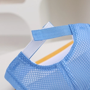 Close-up of sky blue baby mesh sun hat with adjustable yellow Velcro strap at back