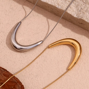 Minimalist V-shaped necklace in 18K gold and silver finish with sleek snake chain
