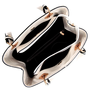 Top-down view of spacious white leather tote bag featuring organized black inner compartments