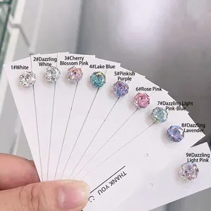 Octagon 8mm crystal stud earrings in nine assorted colors on a thank you card