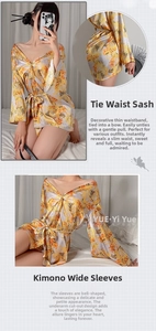 Gelber Blumen-Kimono mit weiten Ärmeln und Taillengürtel in der Detailaufnahme