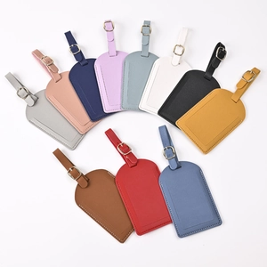 Colorful PU leather luggage tag set with adjustable straps and metal buckles in multiple hues