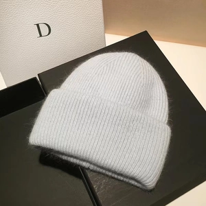 Light blue rabbit hair knit beanie for women showing a soft fluffy texture for winter warmth