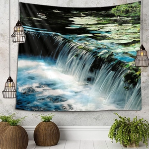 Detail of landscape wall tapestry featuring a waterfall pond on a gray industrial wall