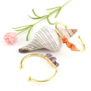 Handmade gold wire-wrapped bangle with natural amethyst and caraway crystal stones