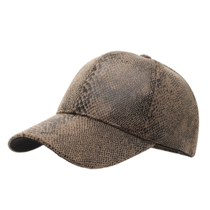 Fashionable snakeskin pattern baseball cap in brown and black with a curved brim design