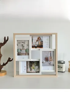 Detail of 4x6in white collage frames in a light wood finish with Life illustrations
