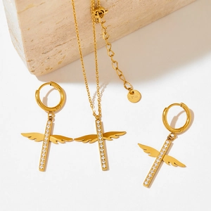 Gold stainless steel angel wing cross necklace and earring set with crystals