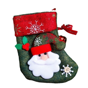 Classic red Christmas stocking with Santa Claus 3D figure and snowflake accents