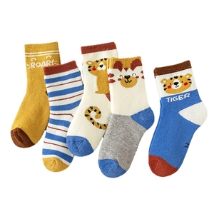 Five pairs of cozy children's cotton socks with cute tiger patterns in blue and yellow