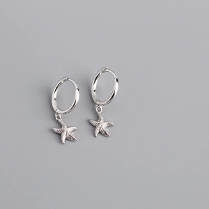 Detailed view of 925 sterling silver hoop earrings with delicate starfish pendants