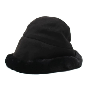 Detailed view of women black winter cloche hat with thick faux fur trim on the brim
