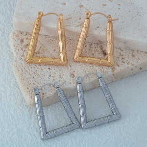 Bamboo-textured geometric hoop earrings in gold and silver stainless steel finishes