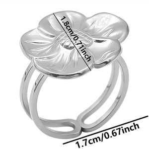 Detail of silver flower ring showing 1.8cm diameter and adjustable band dimensions