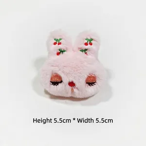 Detail of pink plush rabbit head with cherry embroidery, size 5.5cm x 5.5cm