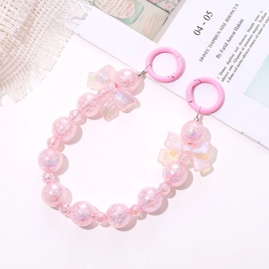 Detail showing pink beaded phone chain with transparent acrylic bows and round clips
